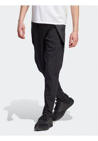 Adidas - adidas Spodnie dresowe City Escape Cargo IJ6098 Czarny Slim Fit. Kolor: czarny. Materiał: syntetyk, dresówka