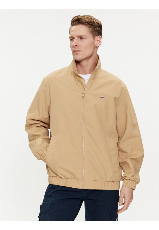 Tommy Jeans Kurtka bomber Essential DM0DM17982 Beżowy Regular Fit. Kolor: beżowy. Materiał: syntetyk