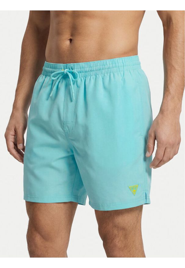Guess Szorty kąpielowe F6GT24 WG282 MEDIUM Niebieski Regular Fit. Kolor: niebieski. Materiał: syntetyk