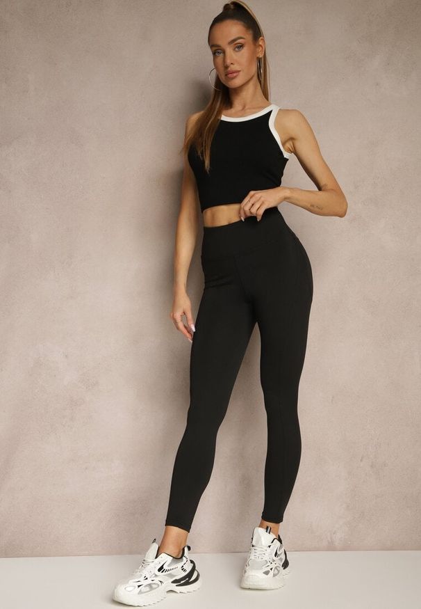 Renee - Czarne Legginsy z Ozdobnymi Przeszyciami z Efektem Modelowania Carittia. Okazja: na co dzień. Kolor: czarny. Długość: długie. Styl: elegancki, casual