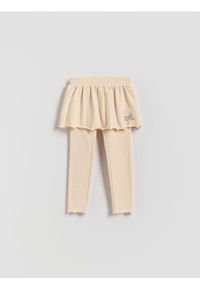Reserved - Spodnie ze spódnicą - kremowy. Kolor: kremowy. Materiał: bawełna