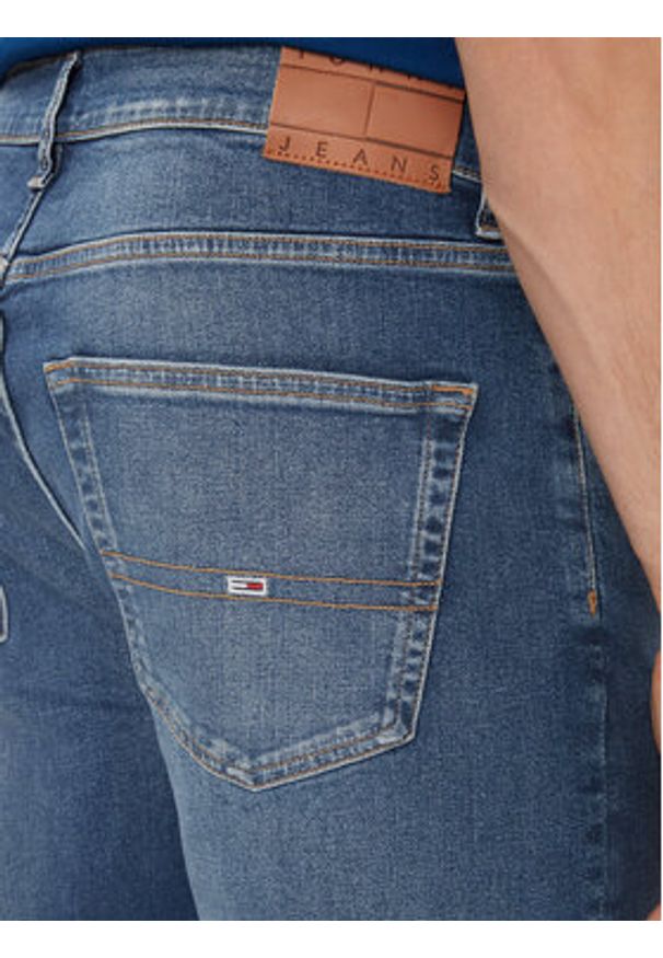 Tommy Jeans Jeansy DM0DM18765 Niebieski Tapered Fit. Kolor: niebieski