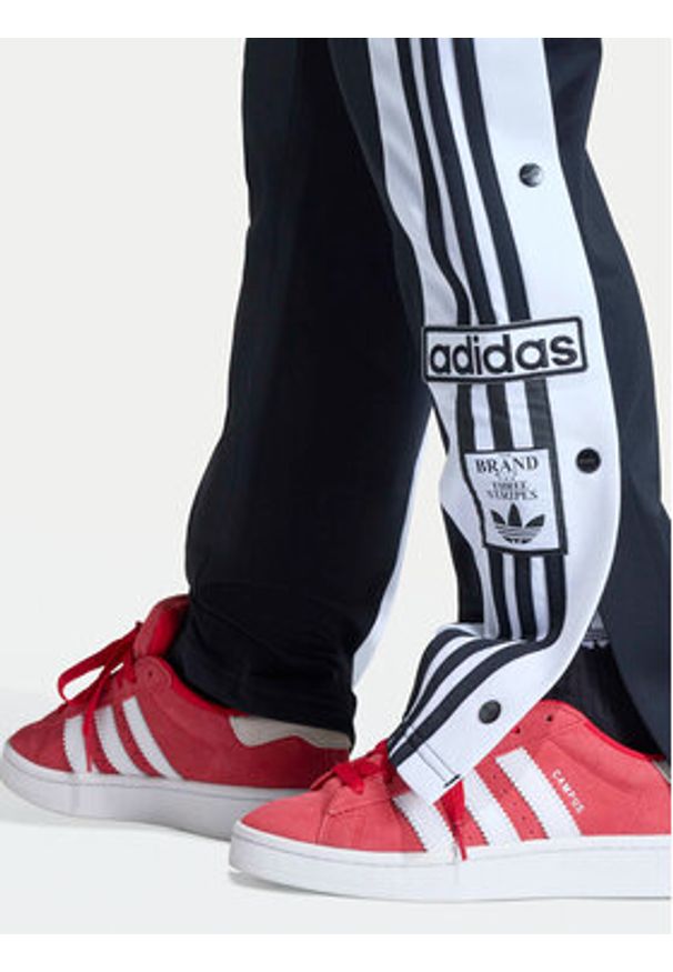 Adidas - adidas Spodnie dresowe Adibreak KD3989 Czarny Regular Fit. Kolor: czarny. Materiał: syntetyk