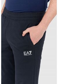 EA7 Emporio Armani - EA7 Granatowe męskie spodnie dresowe. Kolor: niebieski. Materiał: bawełna #6