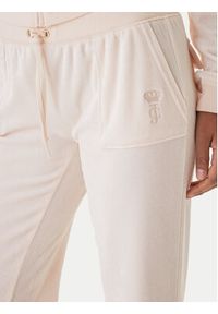 Juicy Couture Spodnie dresowe Caisa JCSEBJ008G Różowy Slim Fit. Kolor: różowy. Materiał: bawełna #2