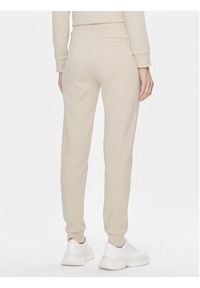Calvin Klein Spodnie dresowe Micro Logo Essential K20K204424 Beżowy Slim Fit. Kolor: beżowy. Materiał: bawełna, dresówka, syntetyk