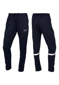 Spodnie Sportowe damskie Nike Dri-FIT Academy. Kolor: niebieski. Technologia: Dri-Fit (Nike) #1