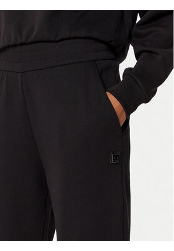 Armani Exchange Spodnie dresowe XW000089 AF10172 UC001 Czarny Regular Fit. Kolor: czarny. Materiał: bawełna