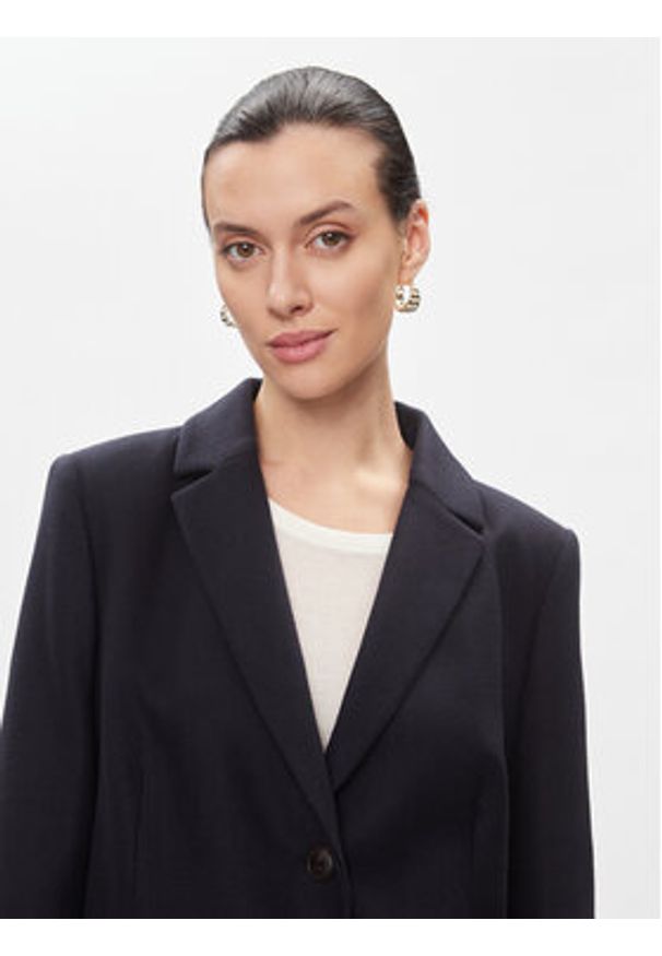TOMMY HILFIGER - Tommy Hilfiger Płaszcz wełniany Classic Light Wool Blend Coat WW0WW41662 Granatowy Regular Fit. Kolor: niebieski. Materiał: wełna