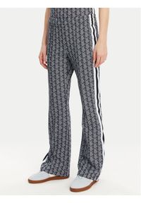 Lacoste Spodnie dresowe XF9313 Granatowy Regular Fit. Kolor: niebieski. Materiał: bawełna, syntetyk