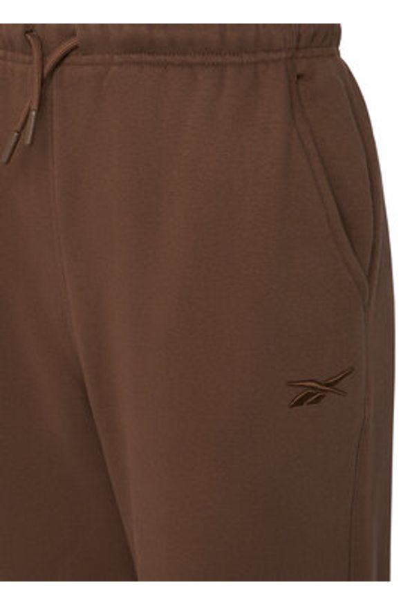 Reebok Spodnie dresowe Reebok X Ewa Chodakowska Evren RK25308CCW Brązowy Regular Fit. Kolor: brązowy. Materiał: syntetyk