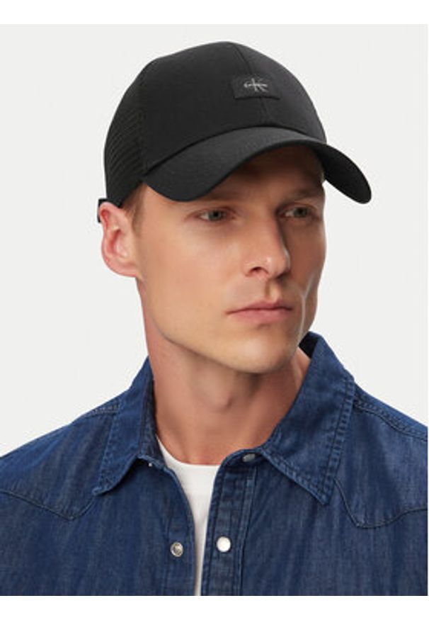 Calvin Klein Czapka z daszkiem Monologo Woven Patch Trucker LV04D5099G Czarny. Kolor: czarny. Materiał: bawełna
