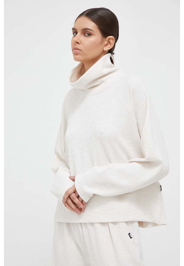 DKNY - Dkny bluza damska kolor beżowy gładka. Kolor: beżowy. Materiał: dzianina. Długość rękawa: raglanowy rękaw. Wzór: gładki