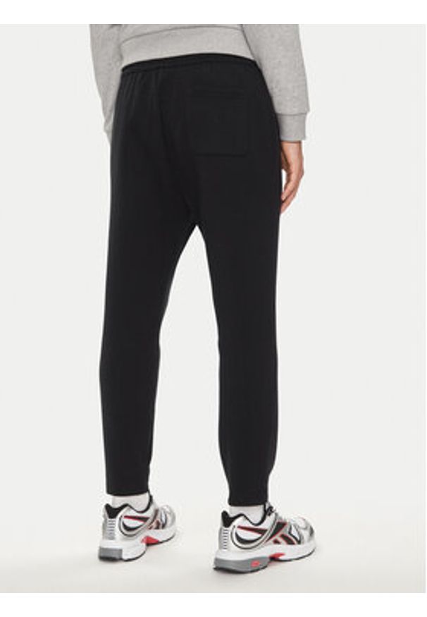 Reebok Spodnie dresowe Actic Coll Dreamblend 100075686 Czarny Regular Fit. Kolor: czarny. Materiał: bawełna