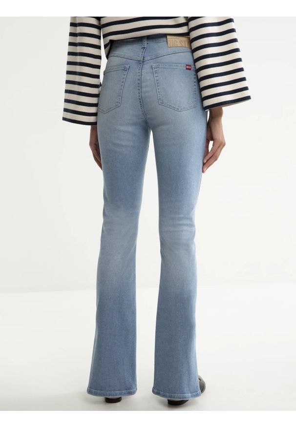 Big-Star - Jeansy damskie bootcut z rozcięciami jasnoniebieskie Blake 219. Kolor: niebieski