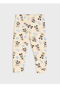 Sinsay - Legginsy ze wzorem Mickey Mouse - kremowy. Kolor: kremowy. Wzór: motyw z bajki #1