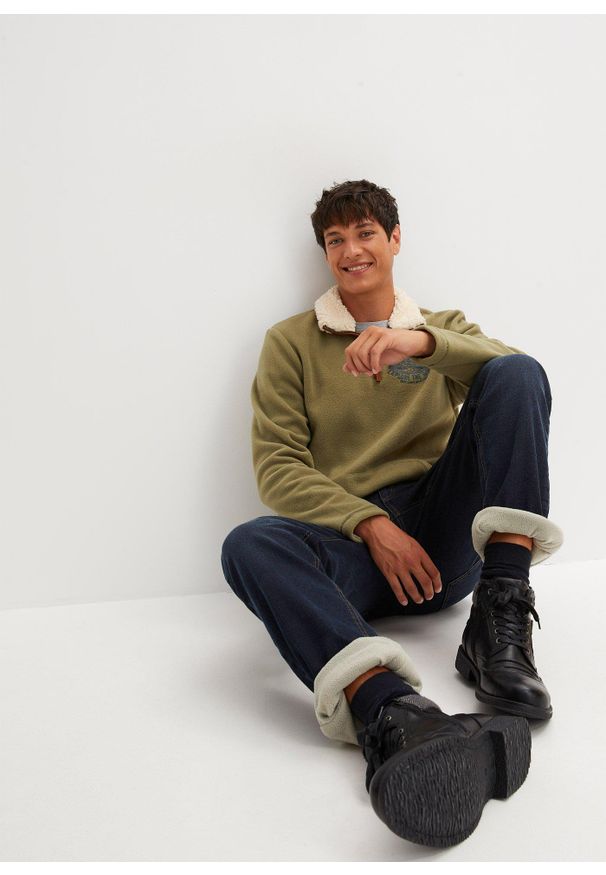 bonprix - Dżinsy termiczne ze stretchem relaxed fit z wygodnym pasem, prosta nogawka. Kolor: niebieski