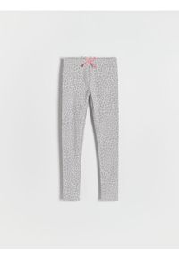 Reserved - Wzorzyste legginsy z kokardką - jasnoszary. Kolor: szary. Materiał: bawełna #1