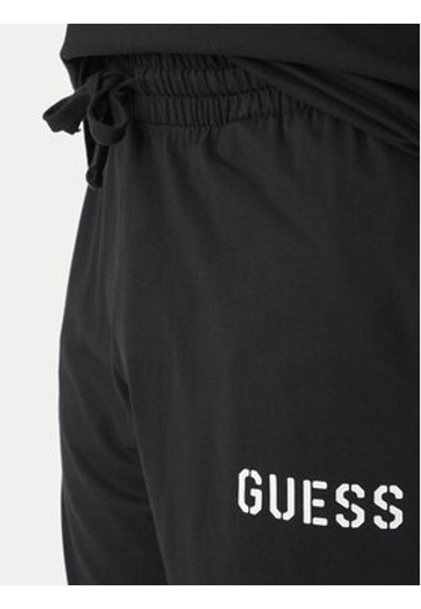 Guess Piżama U6GX02 KCAM1 Czarny Regular Fit. Kolor: czarny. Materiał: bawełna