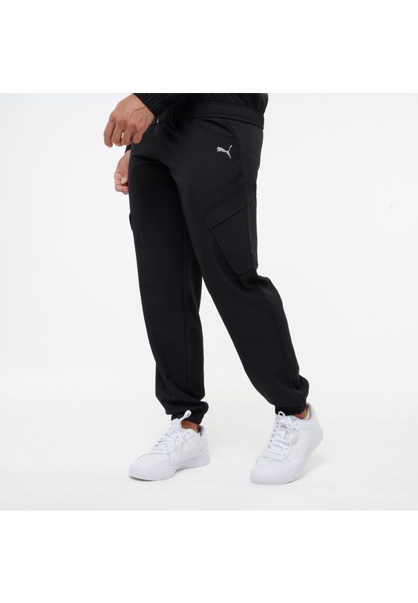 Spodnie dresowe męskie Puma woven. Materiał: dresówka. Sport: fitness, joga i pilates