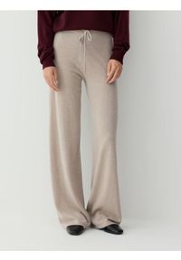 Reserved - Spodnie z wełny merino - beżowy. Kolor: beżowy. Materiał: wełna #1