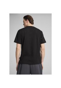Puma - Męska koszulka Concept 2 Paris o luźnym kroju PUMA Black. Kolor: czarny