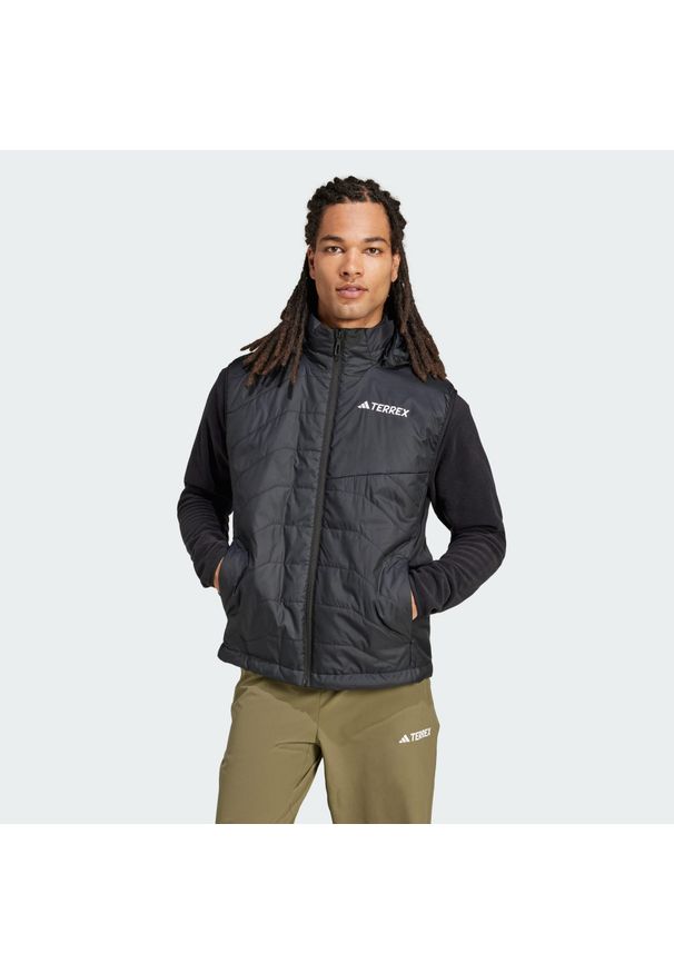 Adidas - Bezrękawnik Terrex Multi Climawarm Insulated Hooded. Kolor: czarny. Materiał: puch. Długość rękawa: bez rękawów. Technologia: ClimaWarm (Adidas). Sport: turystyka piesza