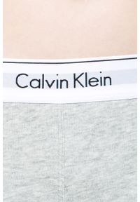 Calvin Klein Jeans - Spodnie. Kolor: szary. Materiał: bawełna, poliester, dzianina. Wzór: gładki, melanż #4