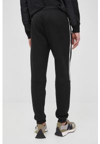 Lacoste spodnie XH1208 męskie kolor czarny gładkie. Kolor: czarny. Wzór: gładki #4