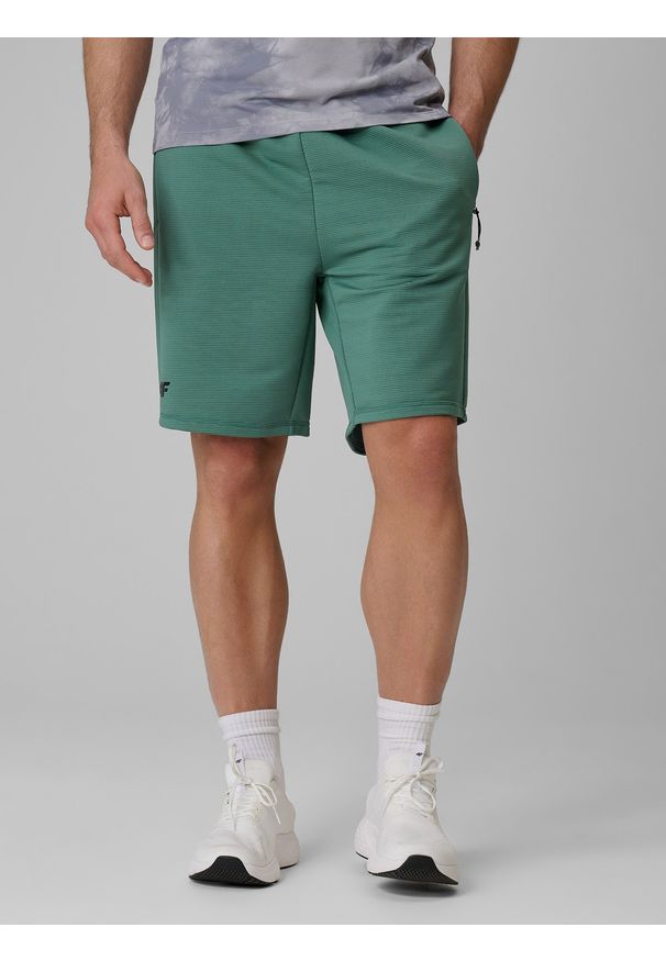 4f - 4F Spodenki treningowe szybkoschnące męskie - turkusowe S. Kolor: turkusowy. Materiał: materiał, włókno. Sport: fitness