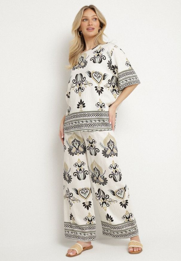 Born2be - Czarno-Beżowy Komplet z Wiskozy w Etniczny Wzór Szerokie Spodnie i Bluzka T-shirt Polliviane. Kolor: czarny. Materiał: wiskoza
