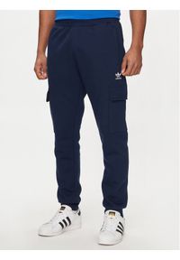 Adidas - adidas Spodnie dresowe adicolor Trefoil IP2757 Granatowy Slim Fit. Kolor: niebieski. Materiał: syntetyk