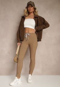 Renee - Ciemnobeżowe Spodnie z Bawełną i Sznurowaniem Purrena. Okazja: na co dzień. Kolor: beżowy. Materiał: bawełna. Styl: casual, elegancki