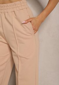 Renee - Beżowe Spodnie Szerokie Pallenassa. Stan: podwyższony. Kolor: beżowy. Materiał: dzianina. Długość: długie #5