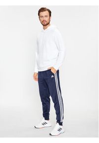 Adidas - adidas Spodnie dresowe Essentials Warm-Up 3-Stripes H46106 Granatowy Regular Fit. Kolor: niebieski. Materiał: syntetyk #4