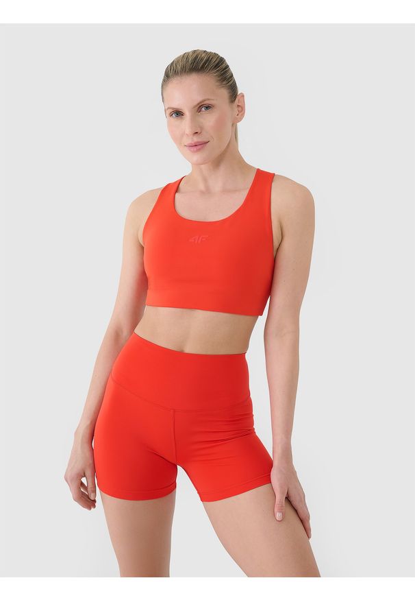 4f - 4F Biustonosz treningowy z niskim wsparciem damski - czerwony S. Kolor: czerwony. Materiał: guma, elastan, materiał, włókno, dzianina, syntetyk. Rodzaj stanika: wyciągane miseczki. Wzór: ze splotem, gładki, jednolity. Sport: fitness, joga i pilates