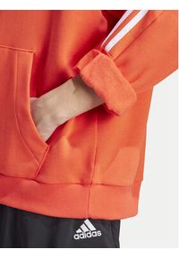 Adidas - adidas Bluza House of Tiro IV8123 Pomarańczowy Loose Fit. Kolor: pomarańczowy. Materiał: bawełna