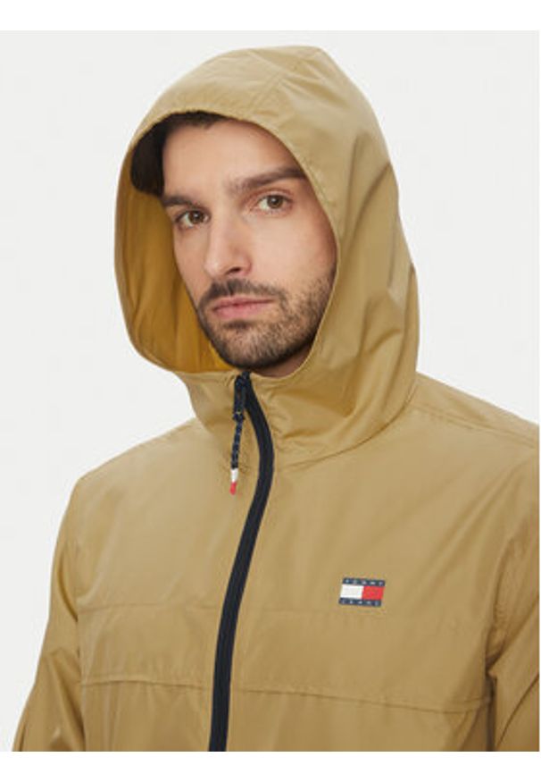 Tommy Jeans Wiatrówka Chicago DM0DM20204 Beżowy Regular Fit. Kolor: beżowy. Materiał: syntetyk