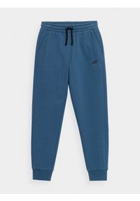 4f - Spodnie dresowe joggery chłopięce. Okazja: na co dzień. Kolor: niebieski. Materiał: dresówka. Styl: casual