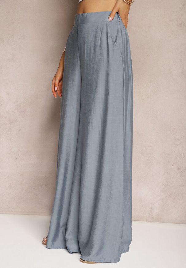 Renee - Niebieskie Luźne Spodnie z Szeroką Nogawką i Kieszeniami Cordya. Kolor: niebieski. Długość: długie