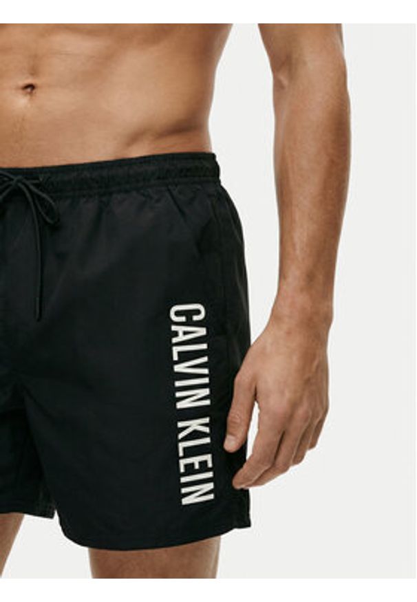 Calvin Klein Swimwear Szorty kąpielowe LV00N61047 Czarny Regular Fit. Kolor: czarny. Materiał: syntetyk