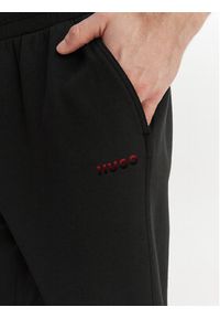 Hugo - HUGO Spodnie dresowe Atlas 50557004 Czarny Regular Fit. Kolor: czarny. Materiał: bawełna #3