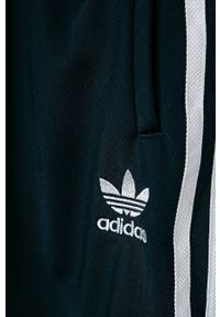 adidas Originals - Spodnie dziecięce 128-164 cm. Kolor: niebieski. Materiał: poliester, dzianina. Wzór: aplikacja #2