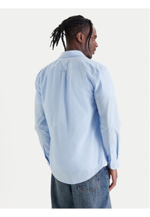 Tommy Jeans Koszula DM0DM22026 Błękitny Regular Fit. Kolor: niebieski. Materiał: bawełna