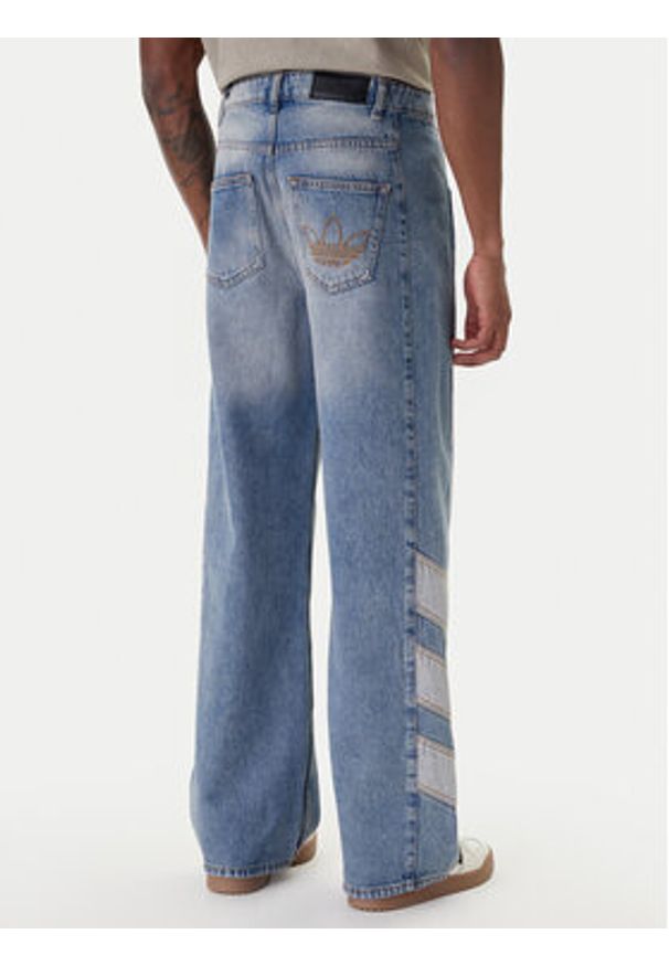 Adidas - adidas Jeansy KE0112 Niebieski Loose Fit. Kolor: niebieski