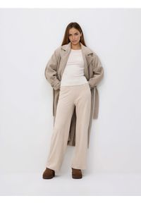 Reserved - Spodnie z przeszyciem - kremowy. Kolor: kremowy. Materiał: dzianina #1