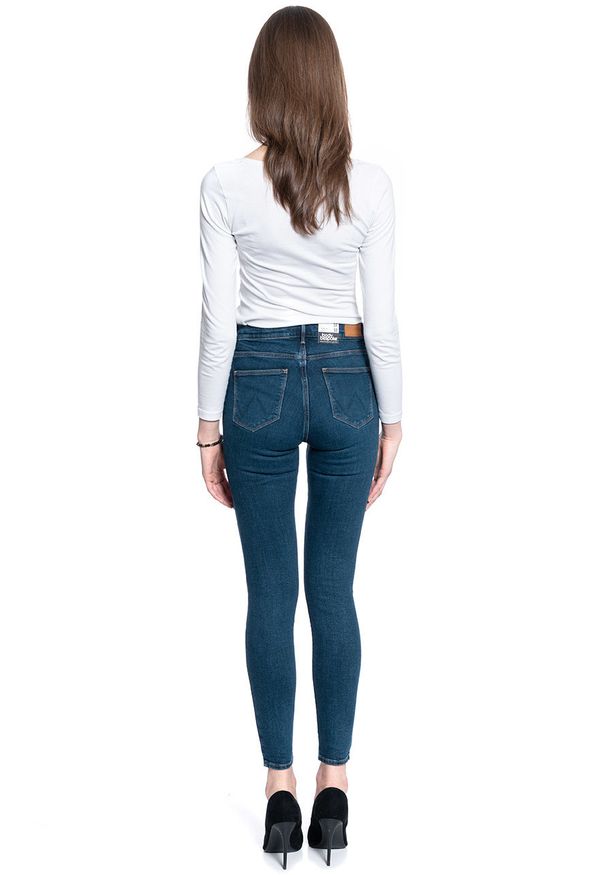 Wrangler - SPODNIE DAMSKIE WRANGLER HIGH RISE SKINNY VINTAGE INK W27HGD18I 112128079. Styl: vintage