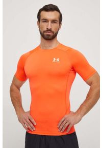 Under Armour t-shirt treningowy kolor czerwony gładki. Kolor: pomarańczowy. Materiał: skóra, materiał. Długość rękawa: raglanowy rękaw. Wzór: gładki