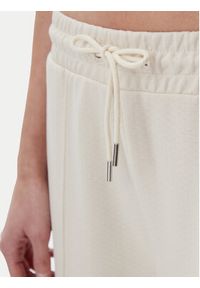 Puma Spodnie dresowe Ess 629774 Beżowy Straight Fit. Kolor: beżowy. Materiał: syntetyk, bawełna #4