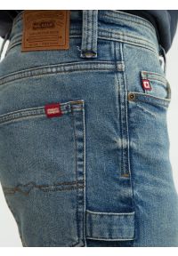 Big-Star - Jeansy męskie z przetarciami niebieskie Colt Workwear 374. Kolor: niebieski. Sezon: zima, jesień. Styl: retro #4